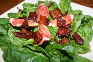 Spinach salad with warmed bacon dressing
