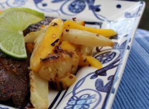 Carmelized pineapple and crisp jicama with juicy mango make for a great side dish.