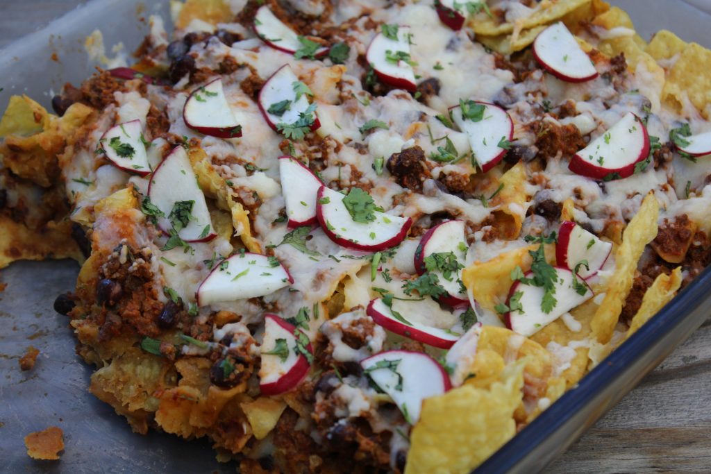 Chipotle pork Chilaquiles with gluten free corn chips